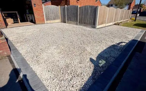 Gravel driveway with a block paved edge